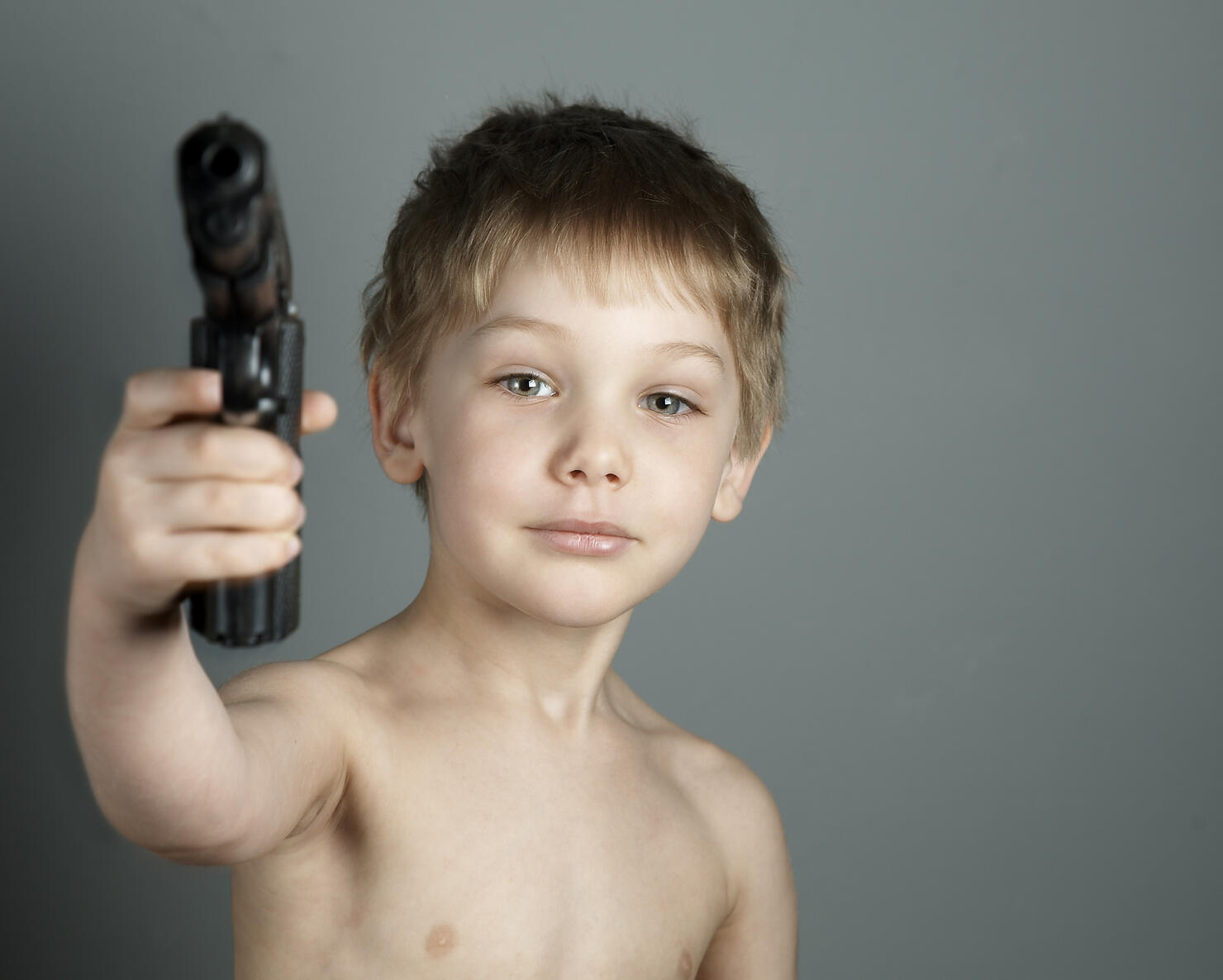 little boy with gun