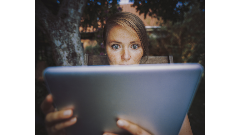 Woman using tablet pc.