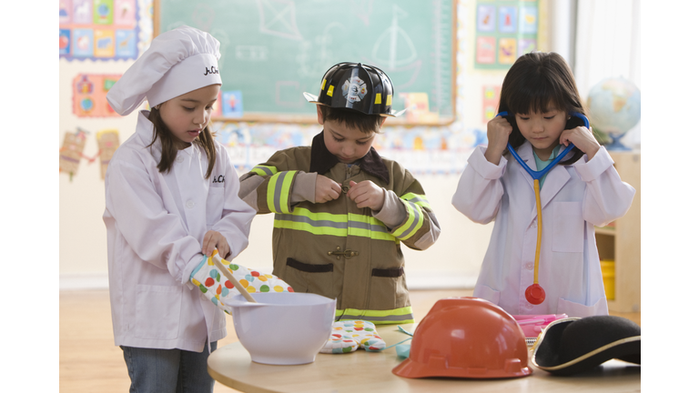 Students dressed as chef, fireman and doctor