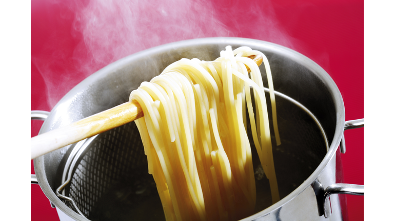 Spaghetti in cooking pot, elevated view