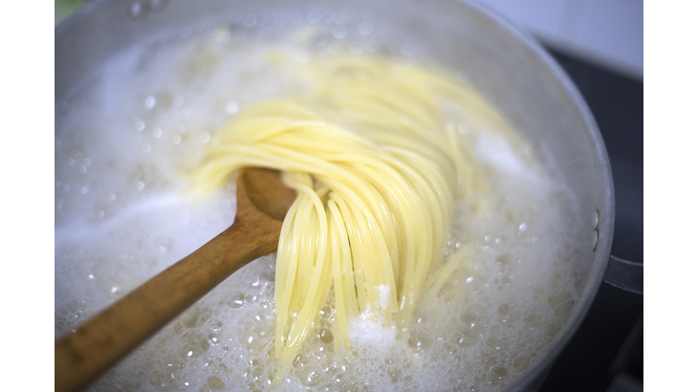 boiled water and spaghetti noodle for cooking italian pasta