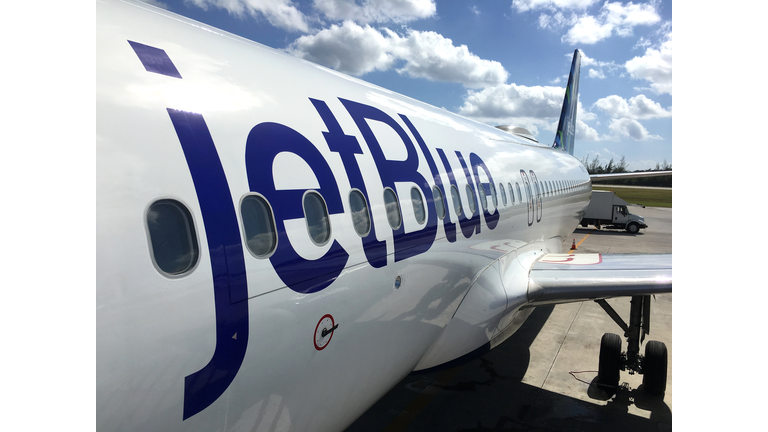 JetBlue land operations and boarding in Owen Roberts Intl. Airport in Grand Cayman Islands