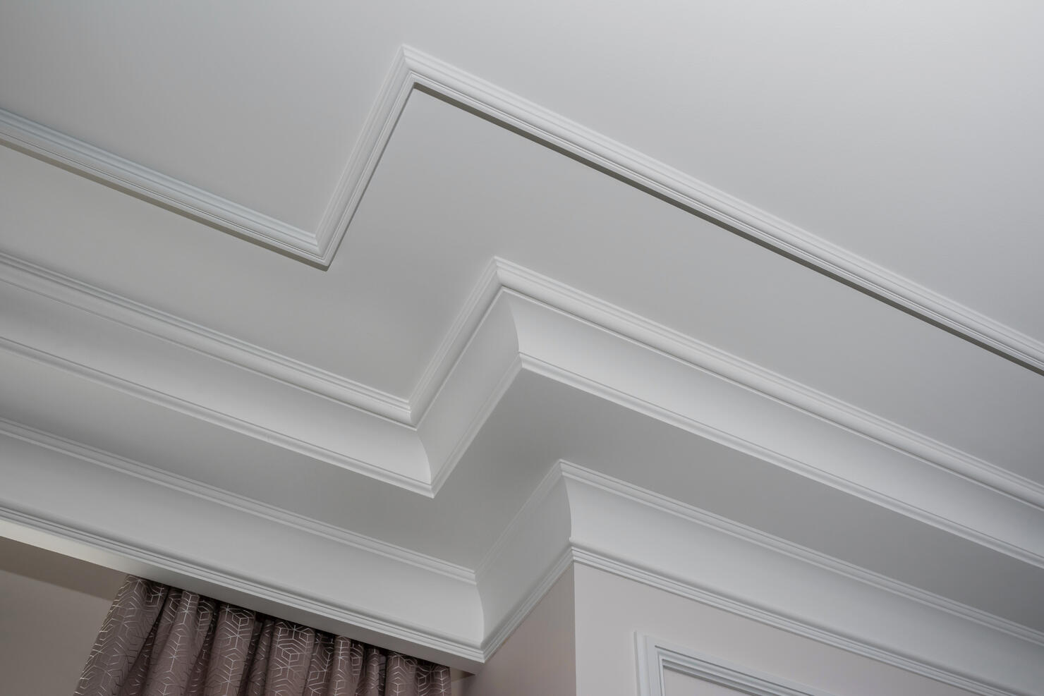 Detail of intricate corner crown molding.  a detail of corner ceiling.
