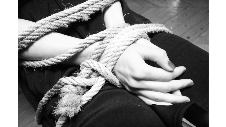 Midsection Of Woman Tied Up With Rope