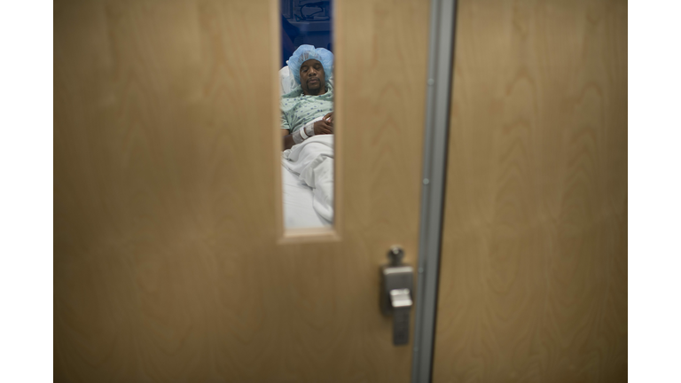 A donor rests outside an operating room 