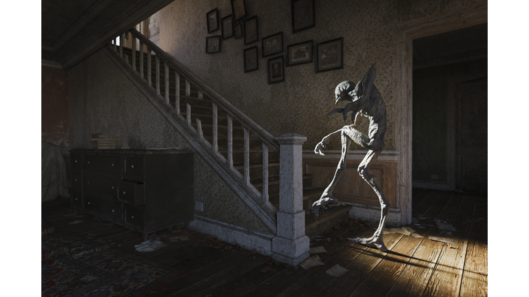 Nightmare: scary demon creeps up stairs in old house