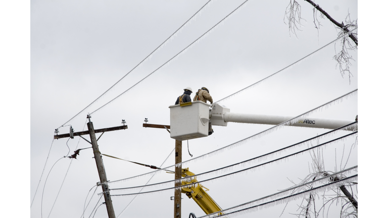 Electric Crews Work to Restore Power