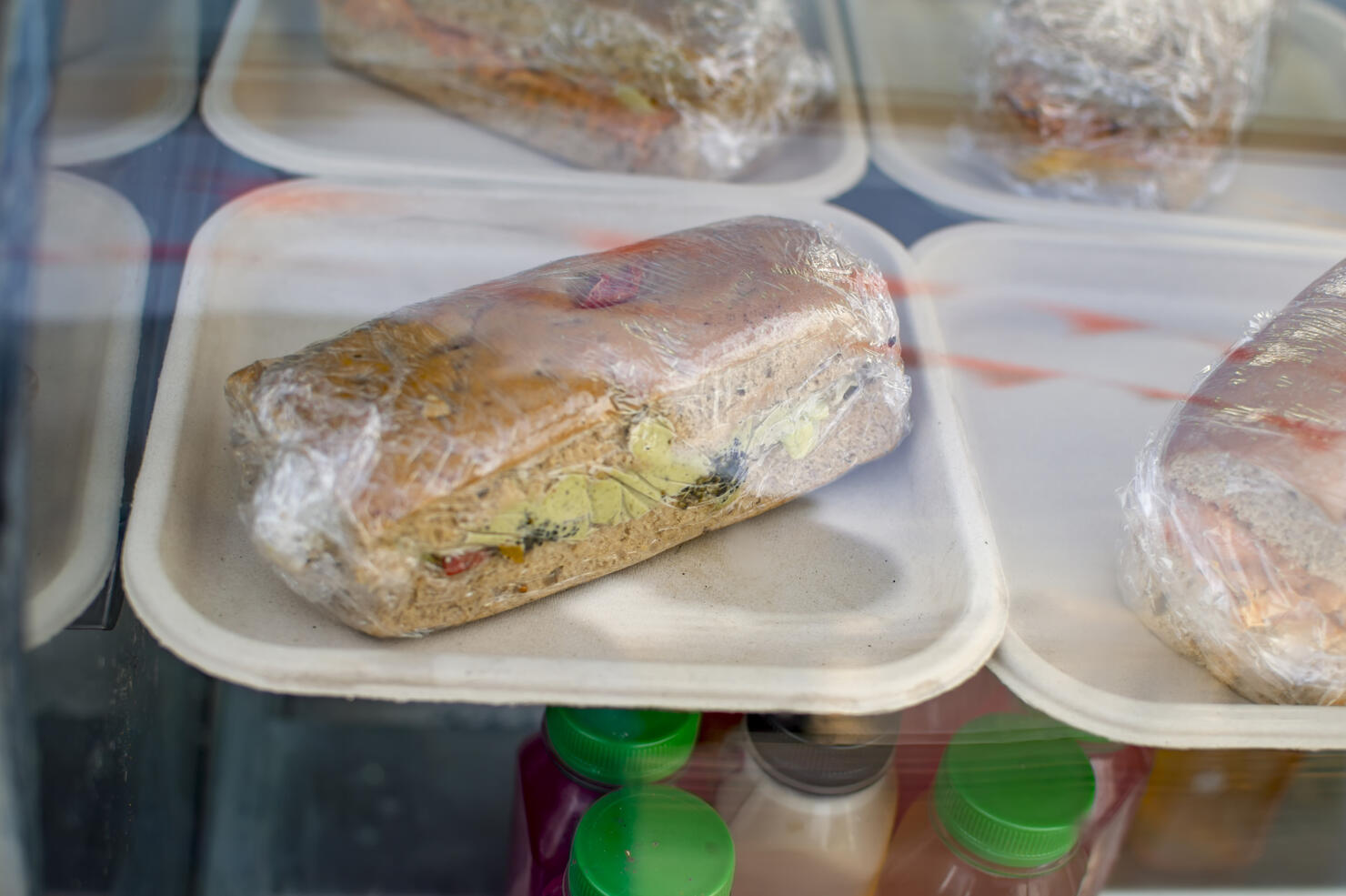 Packaged hamburgers with plate and plastic