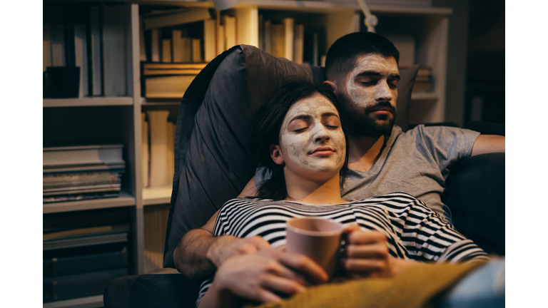 young couple spending evening together at home