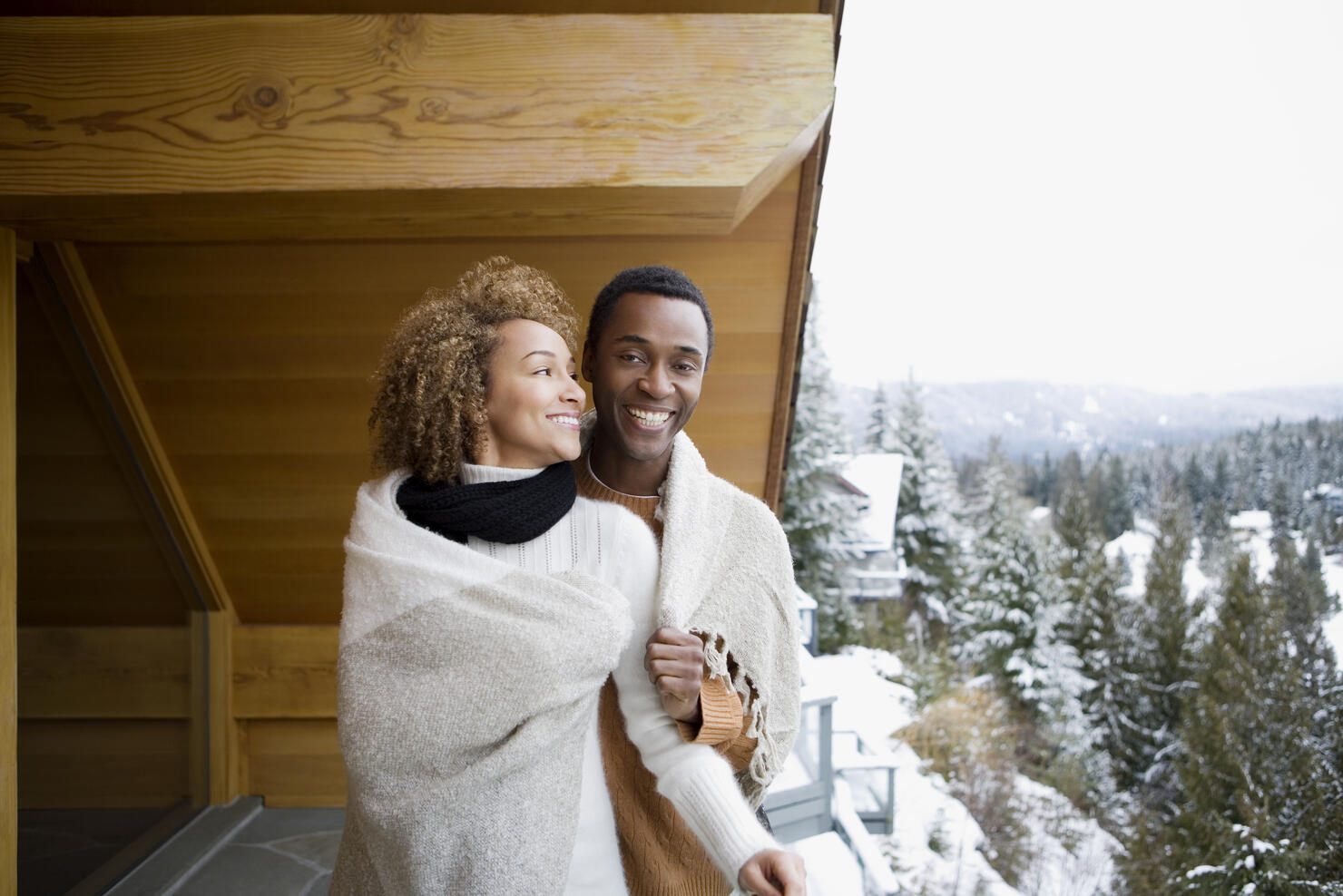Couple wearing a blanket