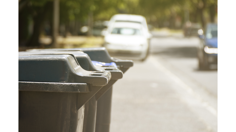 Wheeled garbage can on the street