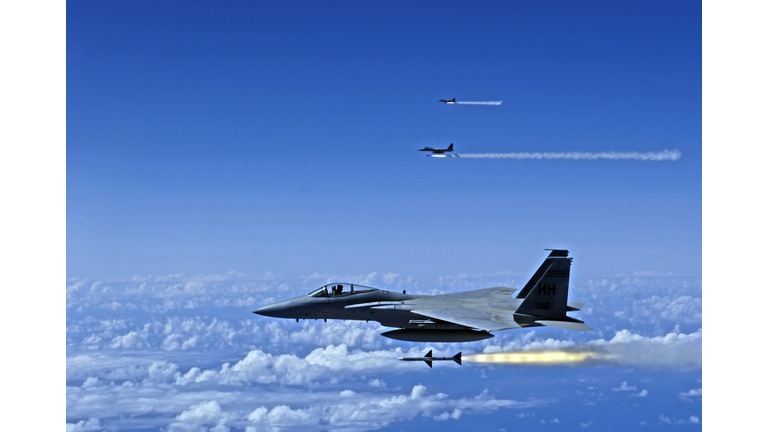 F-15 Eagle aircrafts fire AIM-7 Sparrow missiles at a tactical air-launched decoy over Hickam Air Force Base, Hawaii, July 16, 2006, during exercise Rim of the Pacific (RIMPAC) 2006.