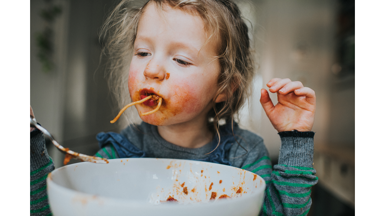 Child eating Spaghetti