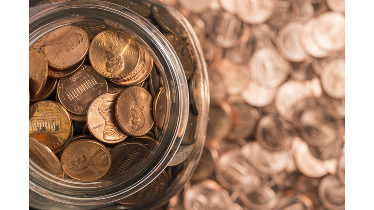 Birds eye view of penny jar overflowing