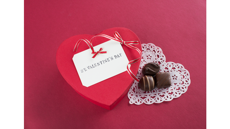 Heart-shaped gift box and chocolates