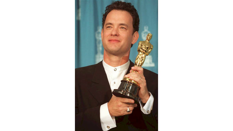 US actor Tom Hanks poses with his Oscar 27 March a