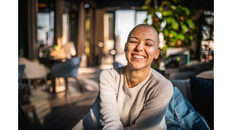 Portrait of a smiling girl with short hair