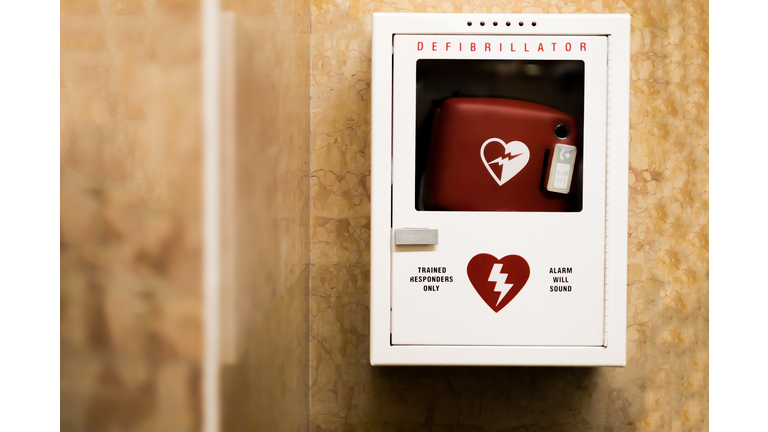 wall-mounted automated external defibrillator “AED”