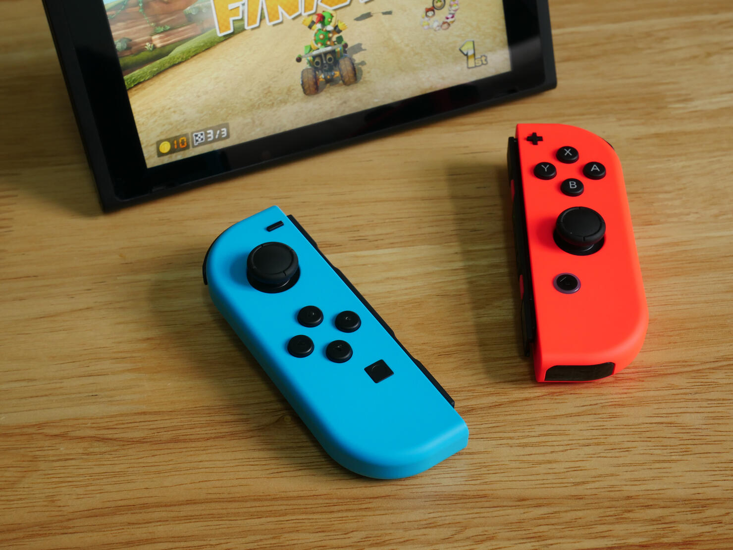 Bangkok, Thailand - June 25, 2017 : Nintendo Switch, the video game console on wooden table.