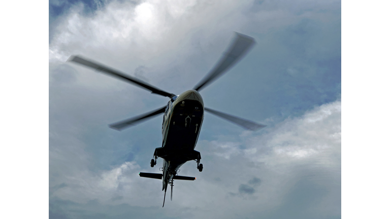 Life flight helicopter hovering in the sky near Auburn, Maine USA