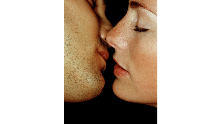 Couple preparing to kiss, close-up