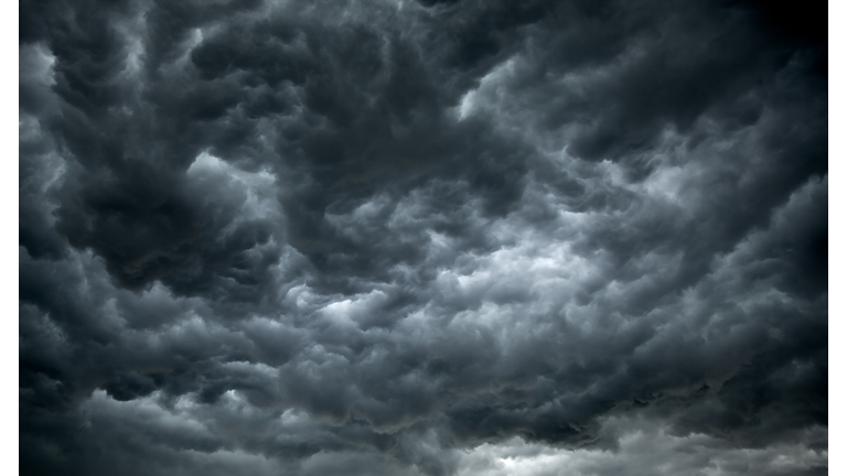 Threatening dark clouds covering the sky