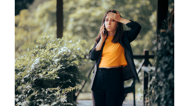 Stressed Event Planner Talking on the Phone