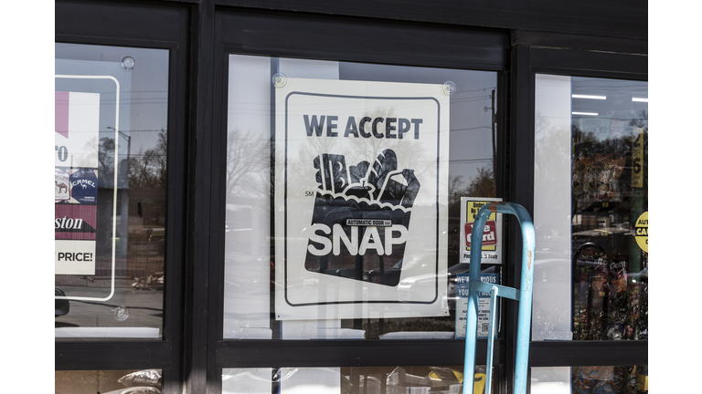 SNAP Accepted here sign. SNAP and Food Stamps provide nutrition benefits to supplement the budgets of disadvantaged families.