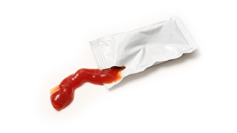 Ketchup on white background