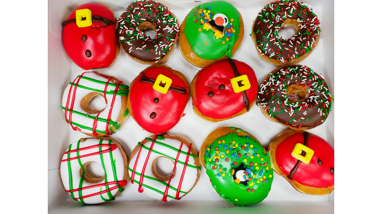 Colorful Christmas donuts in a box