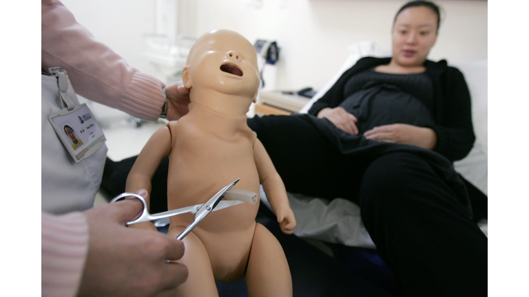 Pregnant Women Attend Child Birth Training Class In Beijing