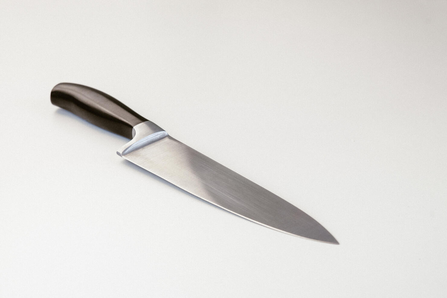 Close-Up Of Knife On White Background