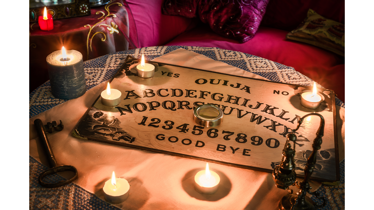 Spiritism table with a Ouija board