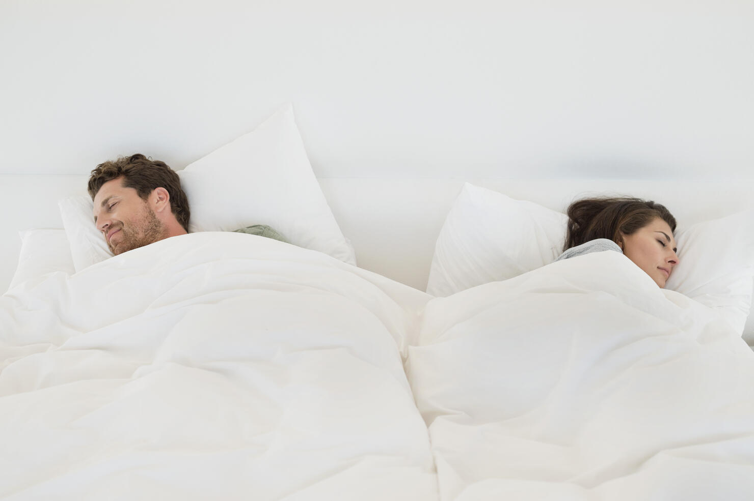 Couple sleeping on the bed