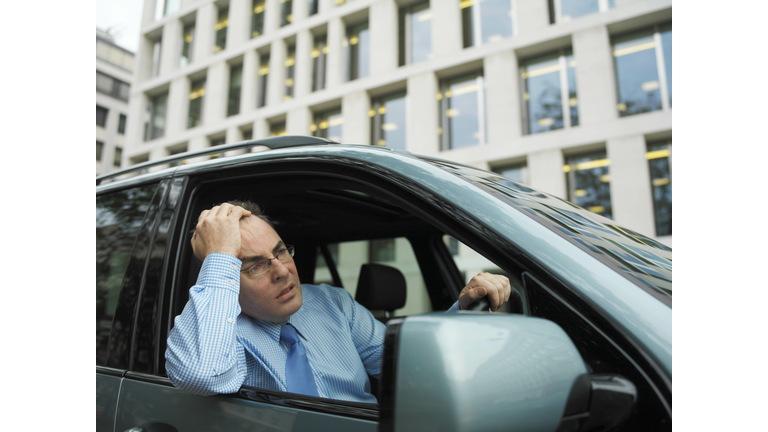 Frustrated businessman in car