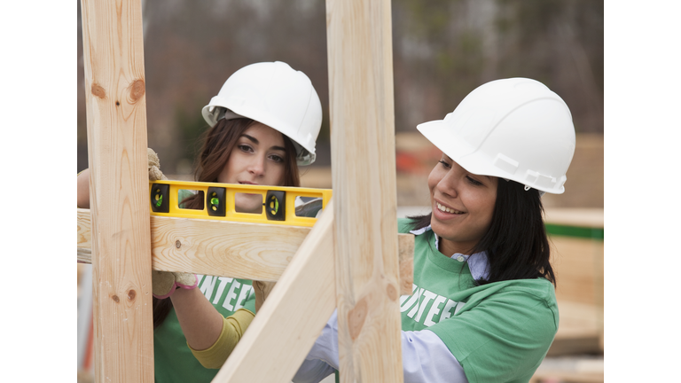 Volunteers working on construction site