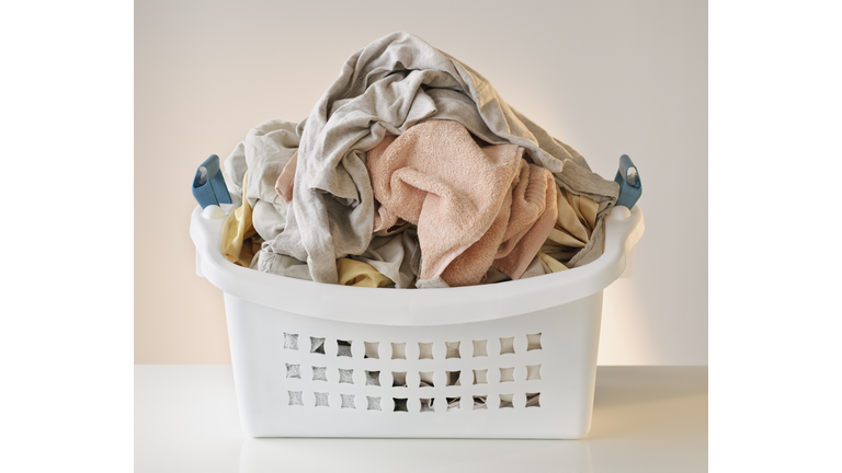 A laundry basket full of clothes