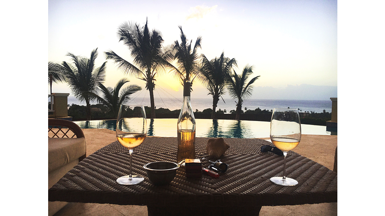 Drinks On Table Against Sky During Sunset
