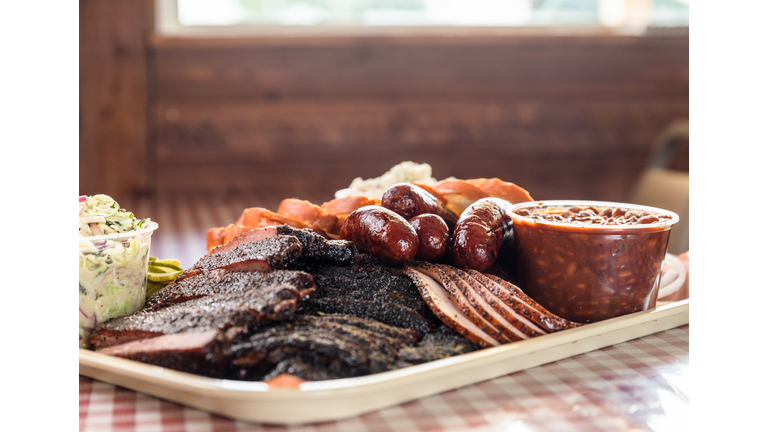 Stack of Smoked Meats on a Tray