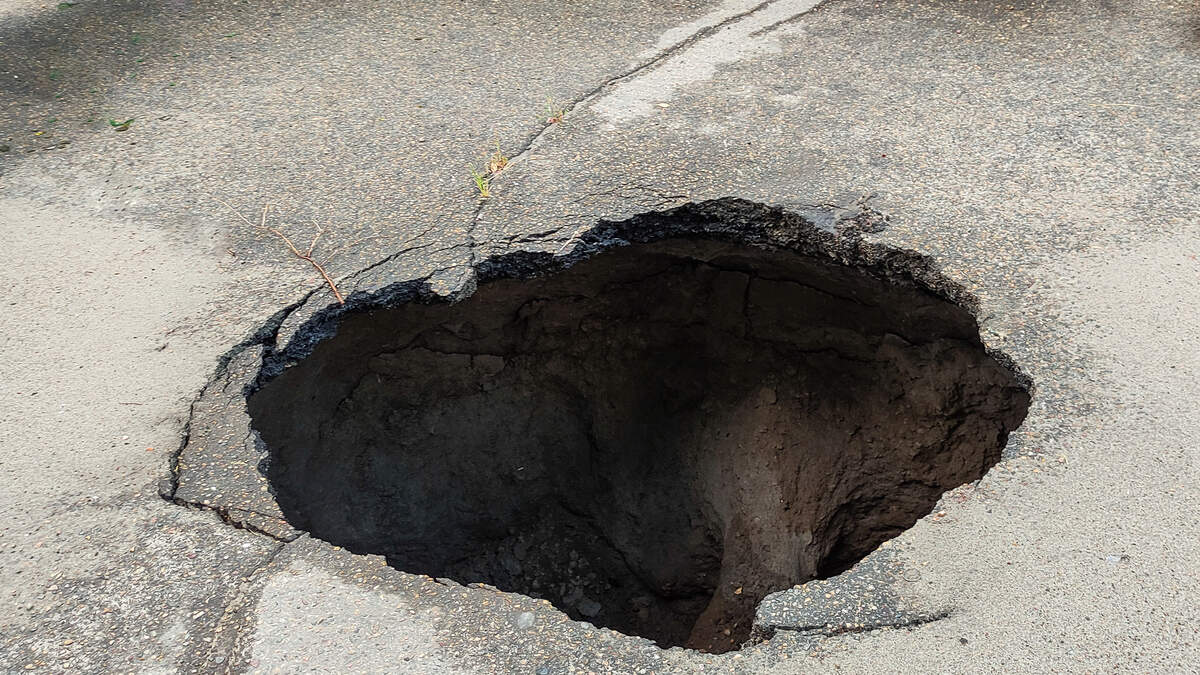 Woman Likely Died Falling Down 30-Foot Sinkhole While Looking For Her ...