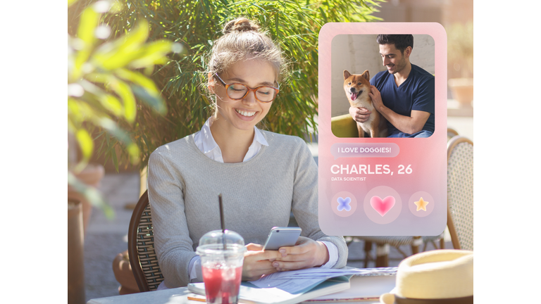 Young woman using dating app on phone, sitting in cafe outdoors