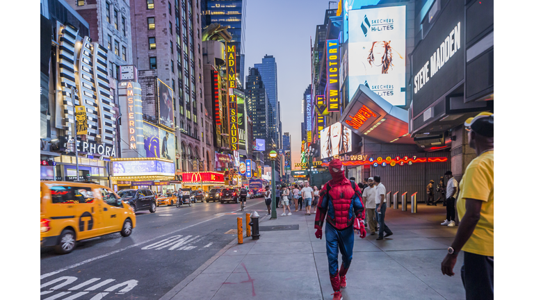 Manhattan, Midtown Manhattan, Broadway, dressed as Spider Man on W 42nd street