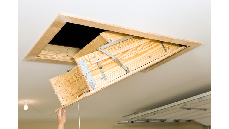 Folding Attic Access Ladder in a Garage