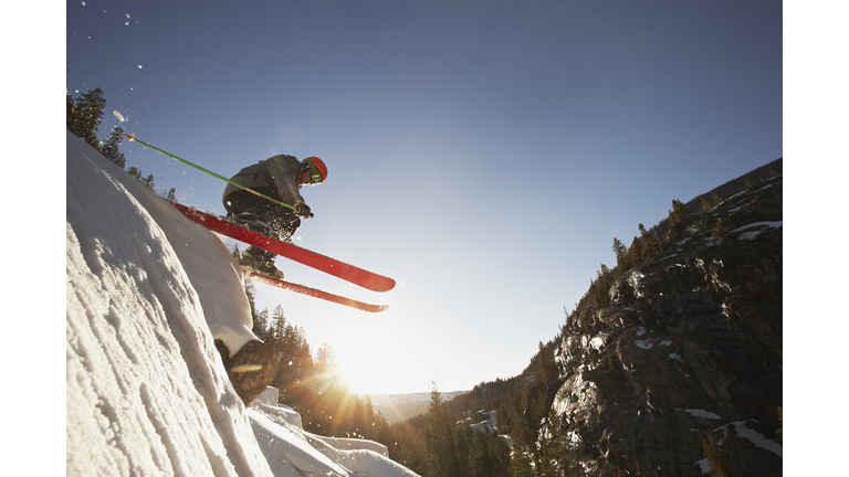 Skier mid jump in Aspen Colorado