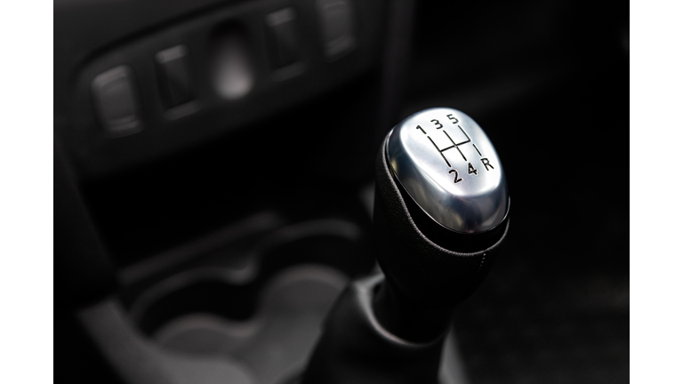 Close-Up Of Human Hand In Car