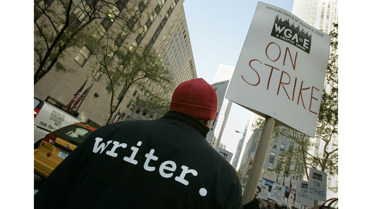 A man with "writer" printed on the back