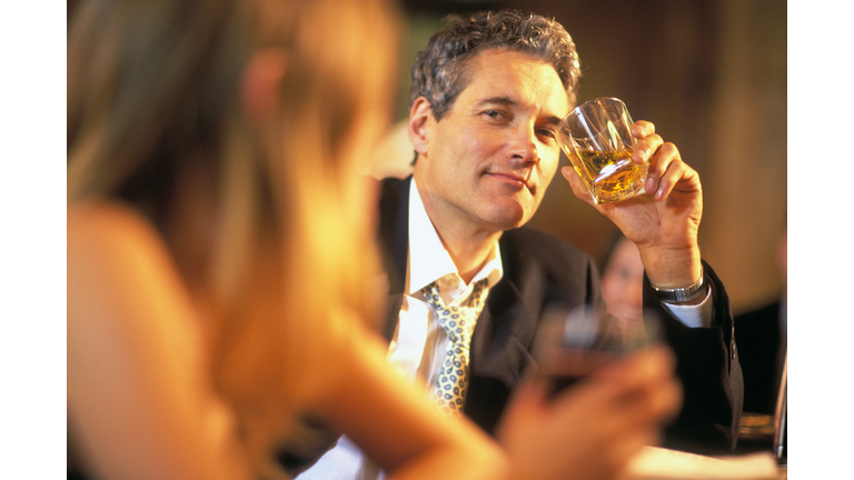 MAN PICKS UP WOMAN AT A BAR