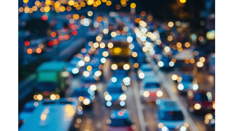 Defocused image of rush hour traffic on busy highway in the evening