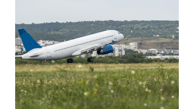 Take-off plane from the airport close.