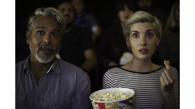 Couple watching movie together